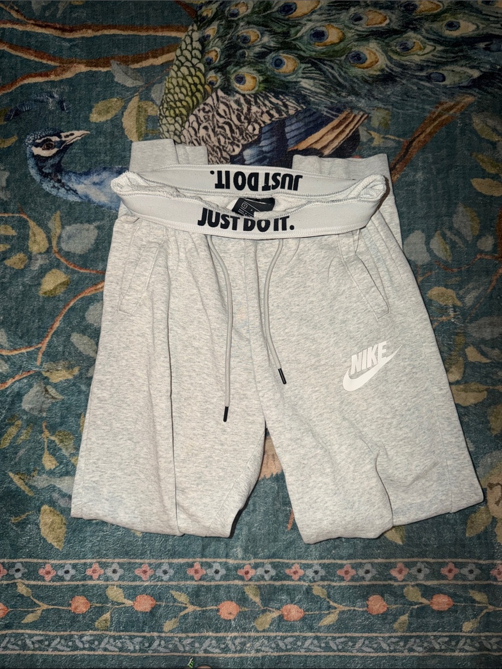 Nike Gray joggers with White Swoosh and Branded Waistband